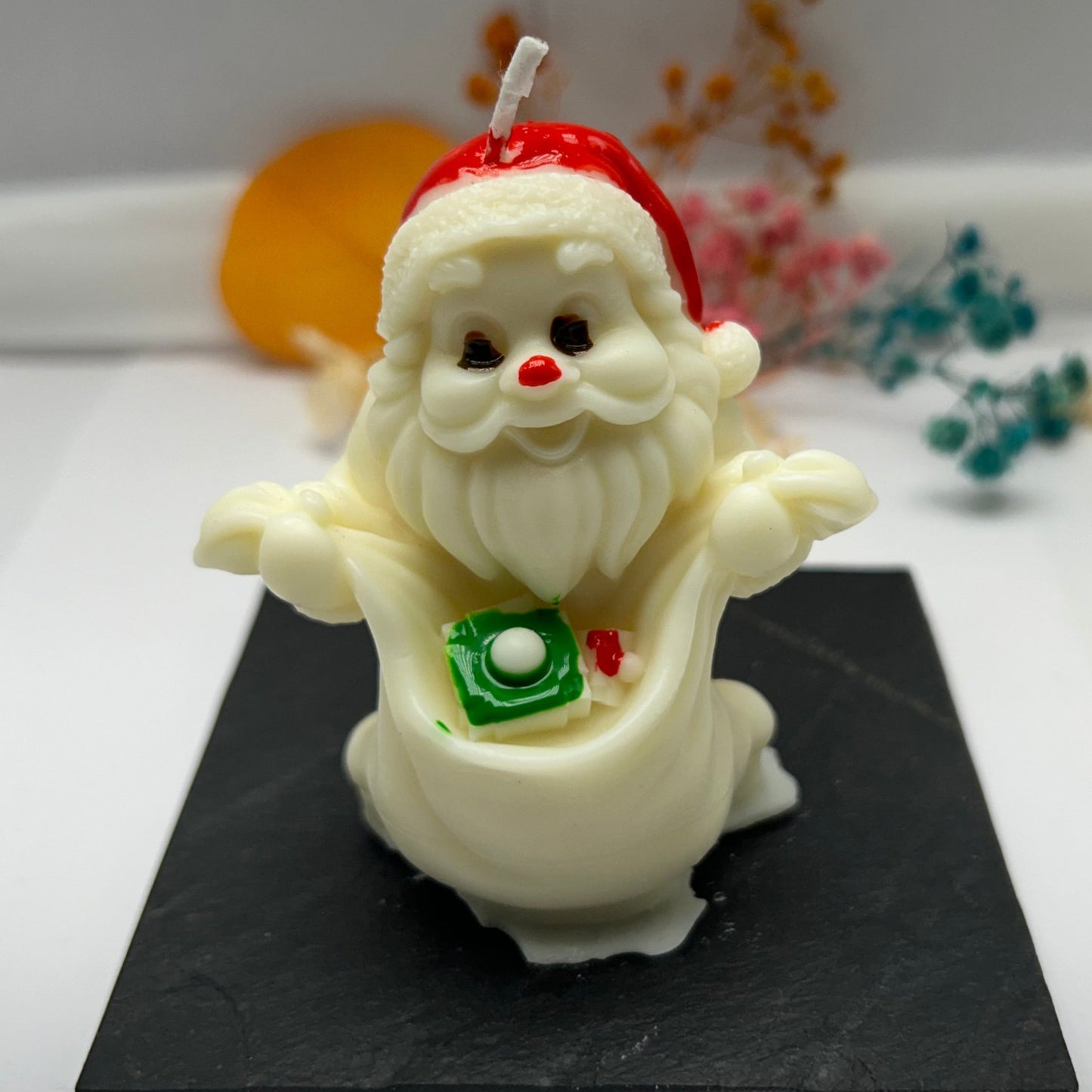 Kerze - Santa mit Geschenksack