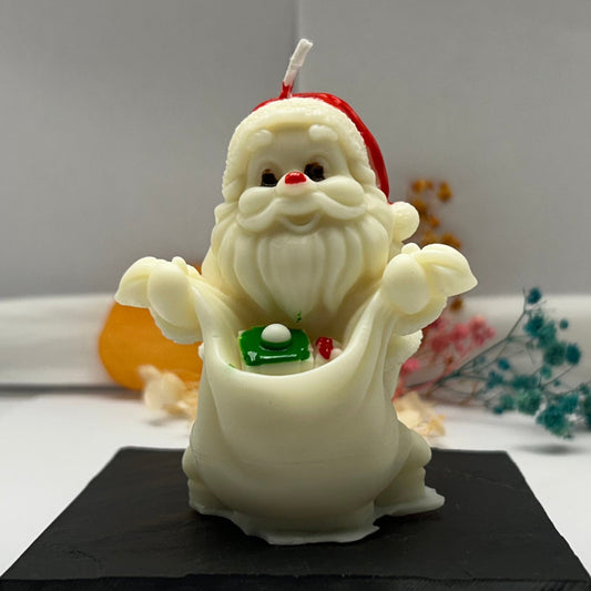 Kerze - Santa mit Geschenksack